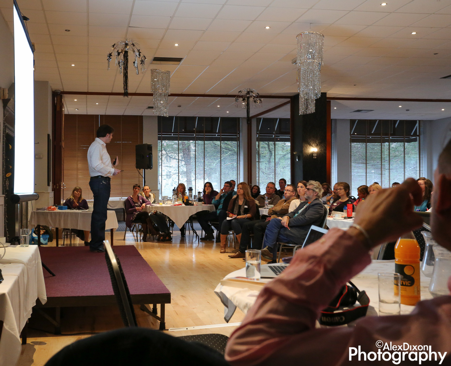 Dr Darren Stevens in conversation with an attentive audience during a talk